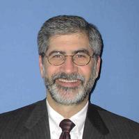 Headshot of award winner, Tom Manheim